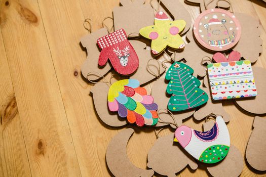 Cardboard toys for the Christmas tree or Christmas garland. Christmas decorations. Selective Focus