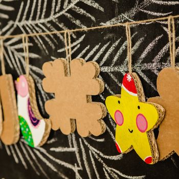 Cardboard toys for the Christmas tree or Christmas garland. Christmas decorations. Selective Focus