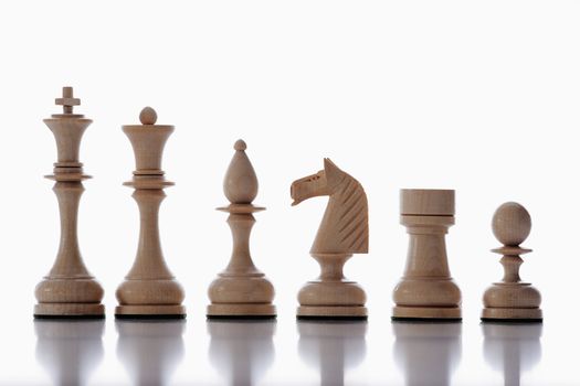 chess - collection of white chess pieces isolated on white background