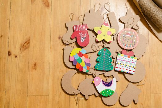 Cardboard toys for the Christmas tree or Christmas garland. Christmas decorations. Selective Focus