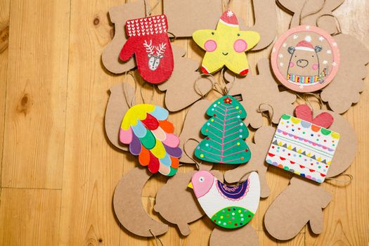 Cardboard toys for the Christmas tree or Christmas garland. Christmas decorations. Selective Focus