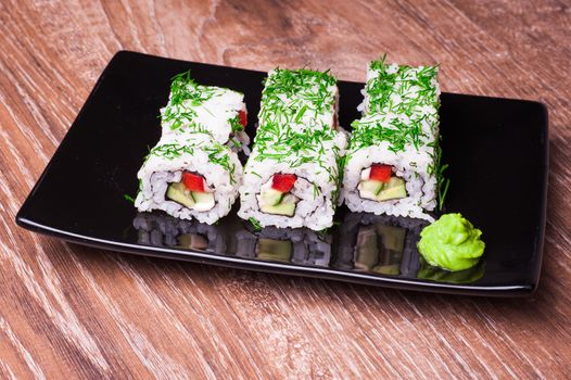 vegetarian sushi set roll on wooden background