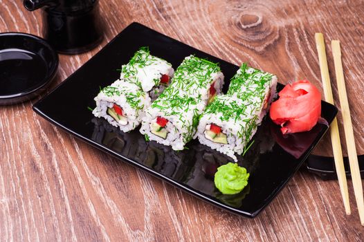 vegetarian sushi set roll on wooden background