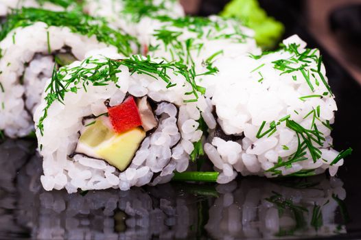 vegetarian sushi set roll on wooden background