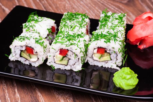 vegetarian sushi set roll on wooden background