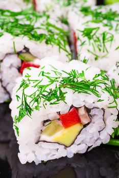 vegetarian sushi set roll on wooden background