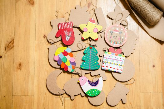 Cardboard toys for the Christmas tree or Christmas garland. Christmas decorations. Selective Focus