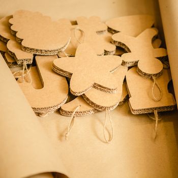 Cardboard toys for the Christmas tree or Christmas garland. Christmas decorations. Selective Focus