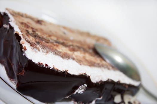 Close view of chocolate cake on the plate.