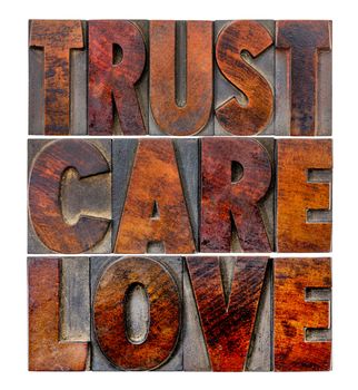 trust, care, love - an isolated word abstract in vintage letterpress wood type