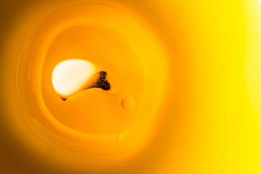 Citronella candle burning and photographed real close from the top.