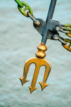 A fork of the Roman god Neptune on the bow of a yacht symbolises protection from the ocean and the elements.