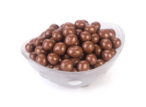 chocolate balls. chocolate balls in bowl on a background.