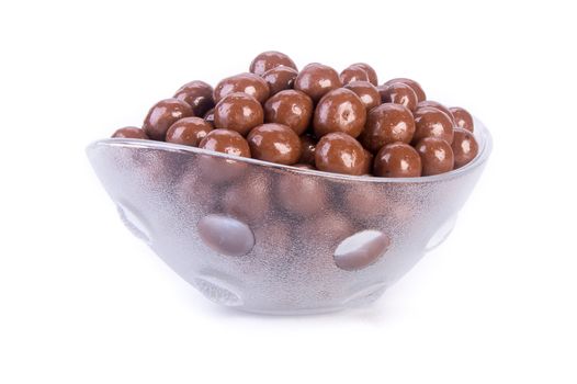 chocolate balls. chocolate balls in bowl on a background.