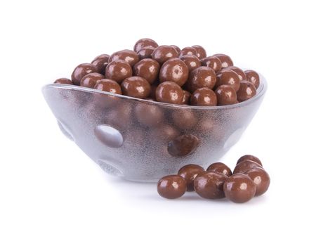 chocolate balls. chocolate balls in bowl on a background.