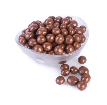 chocolate balls. chocolate balls in bowl on a background.