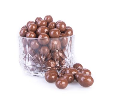 chocolate balls. chocolate balls in bowl on a background.