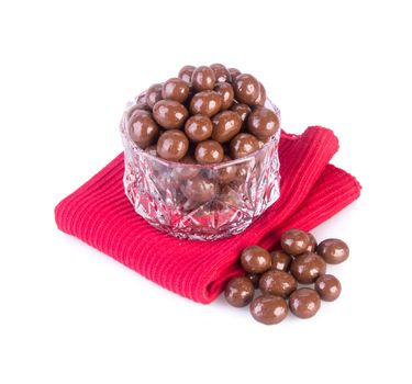 chocolate balls. chocolate balls in bowl on a background.