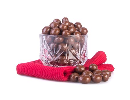 chocolate balls. chocolate balls in bowl on a background.