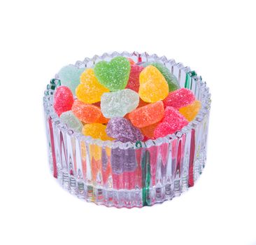 candies. jelly candies in glass bowl on a background.