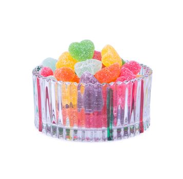 candies. jelly candies in glass bowl on a background.