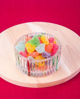 candies. jelly candies in glass bowl on a background.