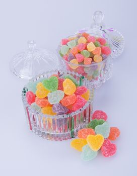 candies. jelly candies in glass bowl on a background.