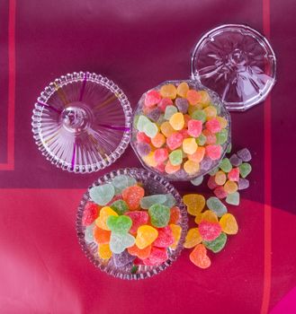 candies. jelly candies in glass bowl on a background.