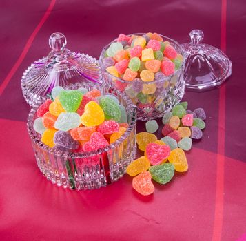 candies. jelly candies in glass bowl on a background.