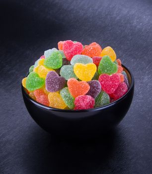 candies. jelly candies in bowl on a background. jelly candies in bowl on a background.