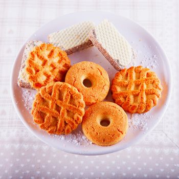 Biscuits of different kinds over a plate