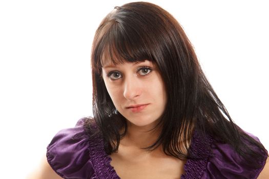 A brown haired woman with purple clothing