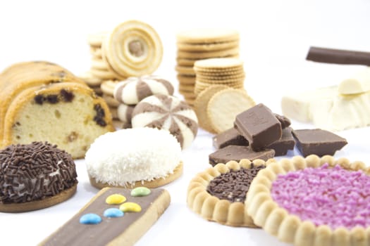 collection of delicious candies, biscuit and Cookies on a white background .