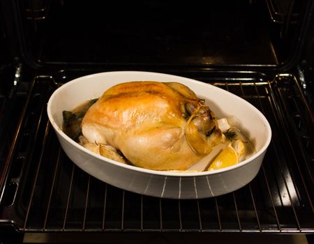 Chicken cooked in the oven with garlic rosemary lemon