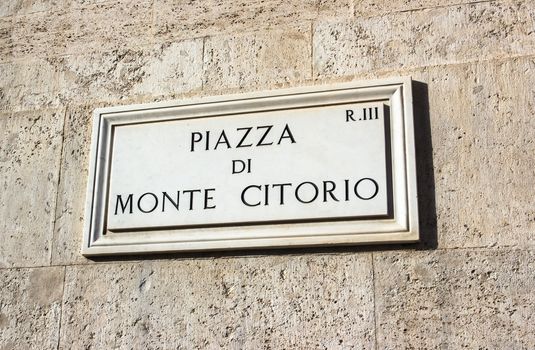 Marble plaque stating the square of Monte Citorio