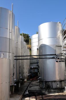 Silos and steel machinery for the processing of the grapes.