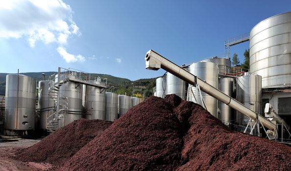 Silos and steel machinery for the processing of the grapes.