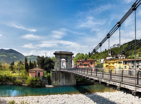 The bridge was designed by engineer Lorenzo Stands in 1840 is one of the first suspension bridges in Italy