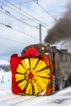 Snowplow steam, along the line of bernina in Swiss