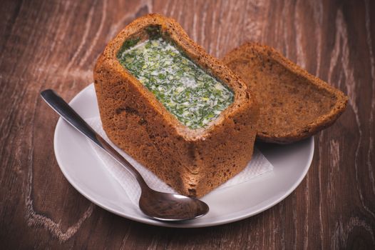 eastern european soup okroshka served in bread 