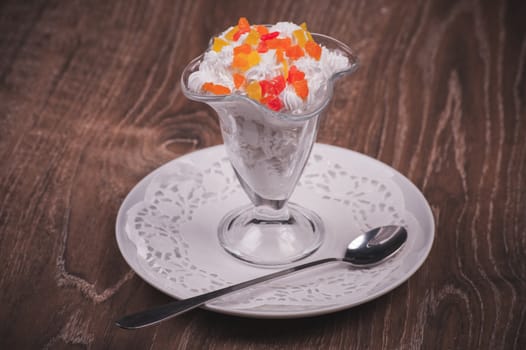 whipped cream dessert with fruit in glass