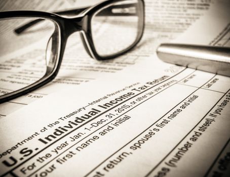 Detail Of A 2015 Tax Return Form With Glasses And Pen
