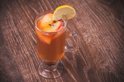 apple and clove hot tea  in glass