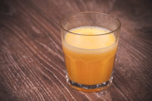 freshly squeezed orange juice in glass citrus