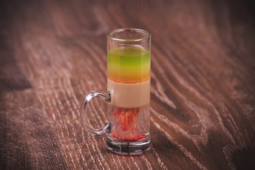 layered colorful shot cocktail with alcohol and vodka