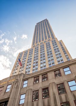 NEW YORK CITY - MAY 23, 2013: The Empire State Building dominates city skyline. It stood as the world's tallest building for more than 40 years (from 1931 to 1972)