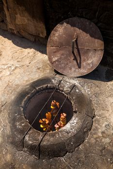 The shish kebab which is fried in the underground furnace the tandoor