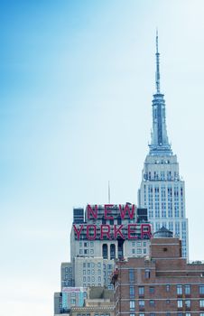 NEW YORK CITY - MAY 23, 2013: The Empire State Building dominates city skyline. It stood as the world's tallest building for more than 40 years (from 1931 to 1972)