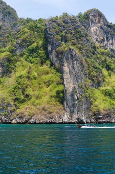 Tourist boat on ocean of Phang Nga National Park in Thailand