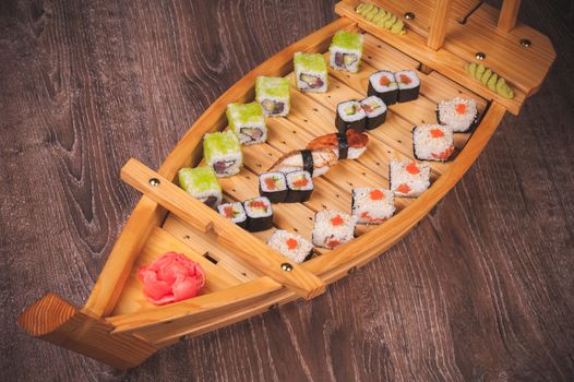 sushi roll, sashimi and nigiri boat set 